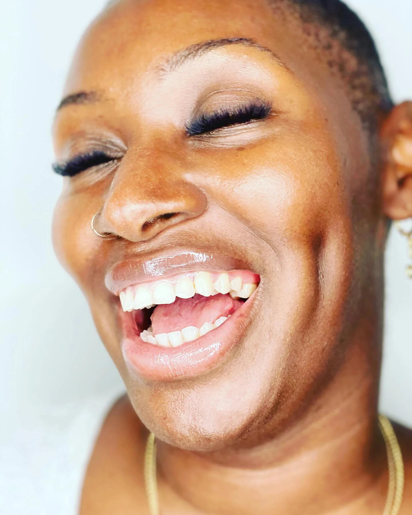 Client smiling after her Lash Lair appointment